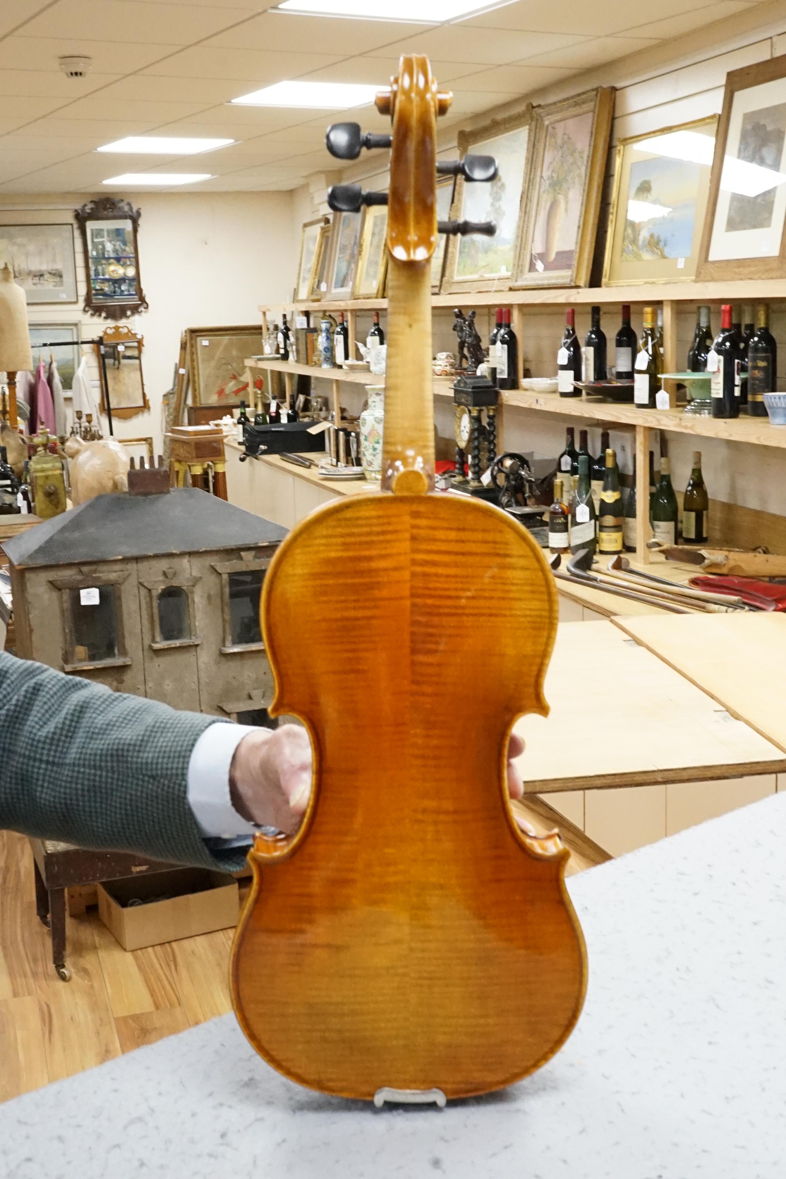 A cased German violin